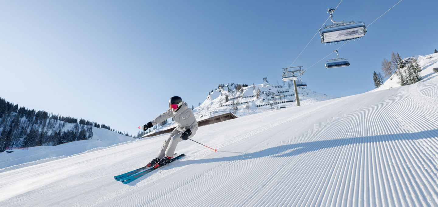 Skifahrer auf perfekt präparierter Piste im Skigebiet Snow Space Salzburg © Wagrain-Kleinarl Tourismus
