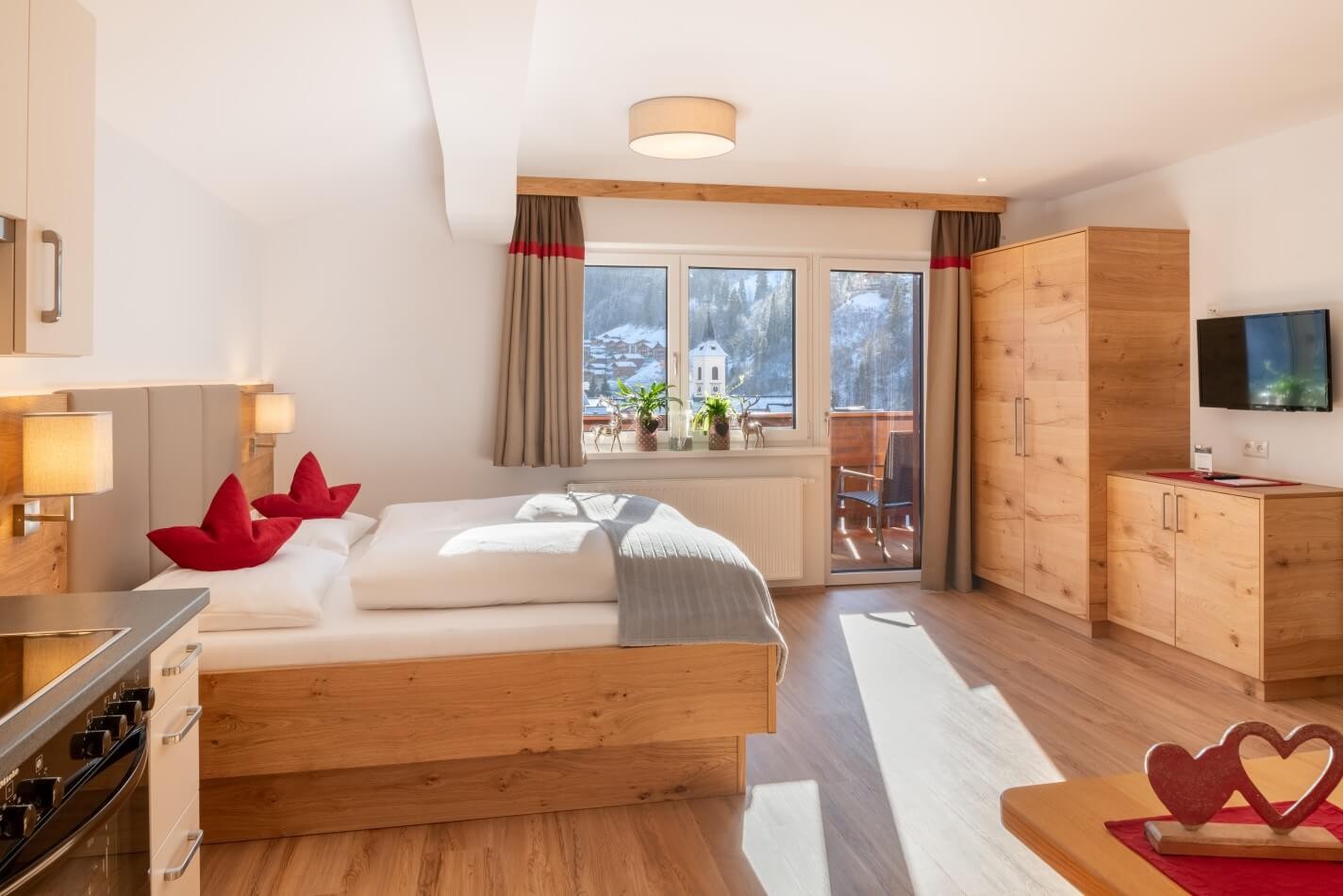 Modernes Schlafzimmer in den Appartements Schattauer mit gemütlichem Doppelbett