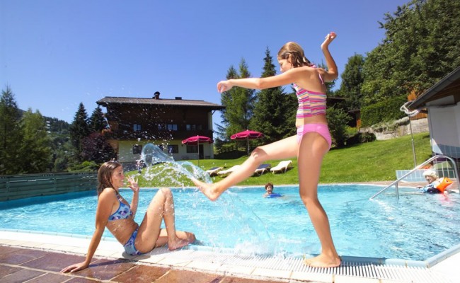 The heated swimming pool at the Schattauer Apartments in Wagrain