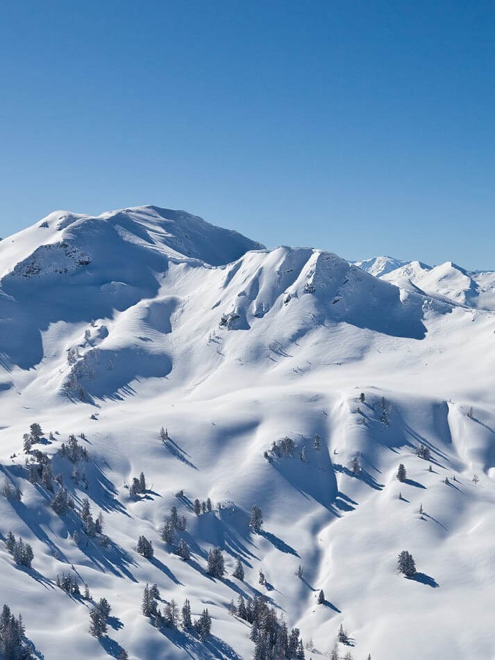 Winterlandschaft mit tief verschneiten Bergen rund um Wagrain im Salzburger Land &copy; Wagrain-Kleinarl Tourismus